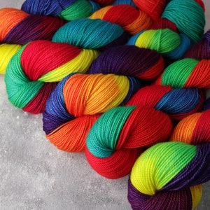 Merino 4 ply/ fingering/ sock weight 100% wool superwash hand dyed knitting yarn 100g - ‘Lollipop’ -variegated bright rainbow
