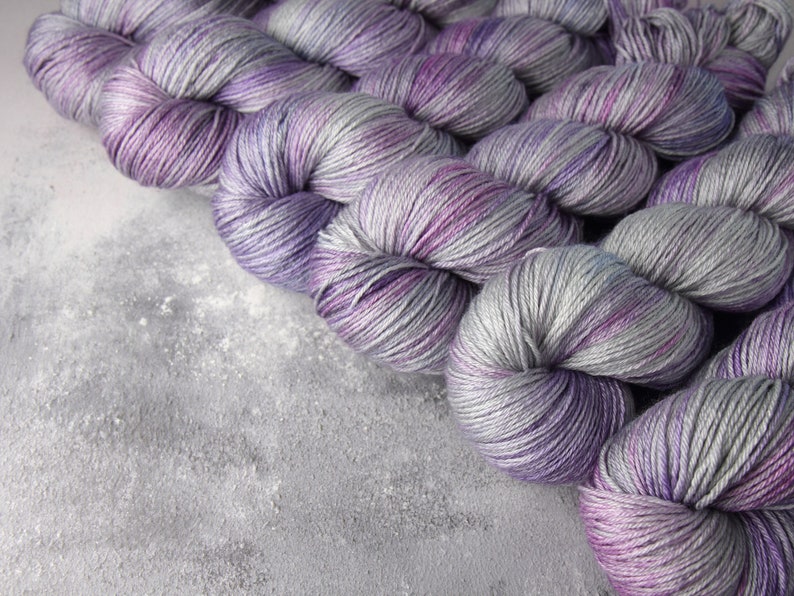 4 Ply British Wool & Silk fingering weight hand-dyed knitting yarn 100g Moonstone silver grey variegated pale purple BFL blend image 1