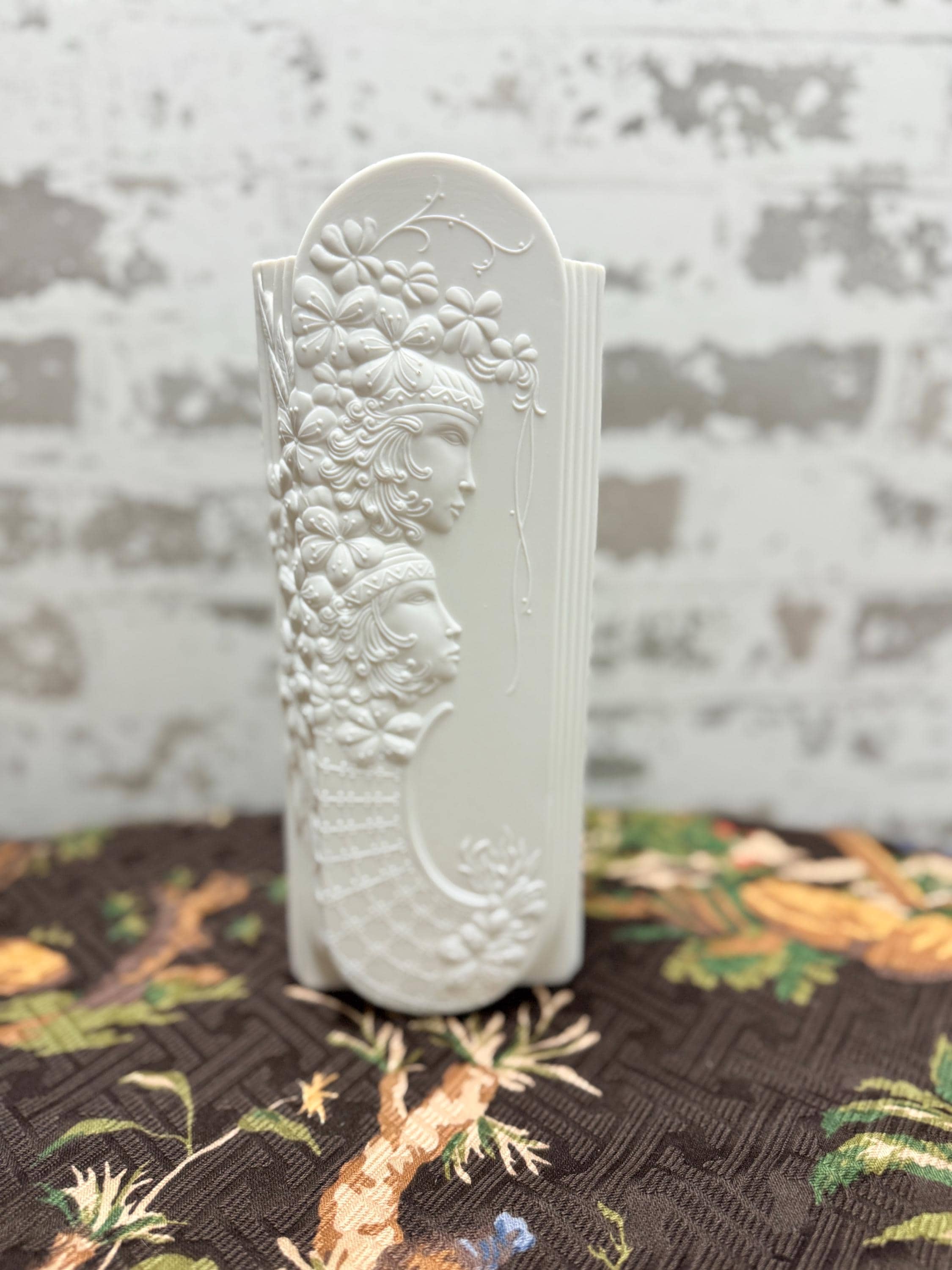 Kaiser German porcelain vase of relief design of two women