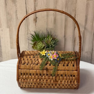 Vintage wicker basket purse with floral decorations