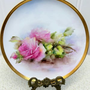 Hand-painted porcelain plate of pink roses artist signed