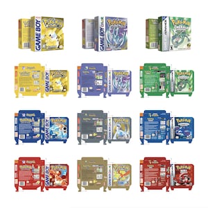 May include: A collection of vintage Pokémon video game boxes. The boxes feature various Pokémon characters and game titles, including "Pokémon Emerald Version" and "Pokémon Ruby." The boxes are in various colors, including yellow, blue, and green.