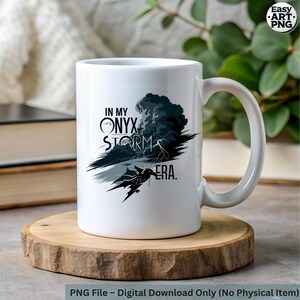 May include: White ceramic mug with a black and gray graphic design. The graphic features a dragon silhouette flying through a stormy sky with the text "In My Onyx Storm Era."