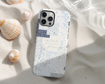 May include: A phone case with a patchwork design in shades of blue and white, featuring floral patterns and geometric shapes. The case has a quote that reads "may Jesus be seen to me so spite of me."