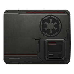 May include: A rectangular, dark grey mouse mat with a textured, metallic appearance. The design features a black Imperial symbol and red accent lines. The overall aesthetic is reminiscent of a sci-fi or industrial theme.