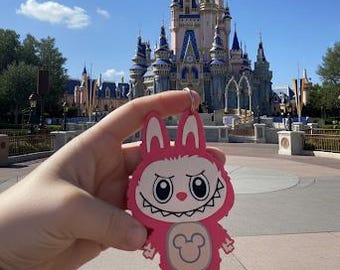 Soporte Little Monster Disney Magicband+ Plus, llavero Puck Pals para Magic Band+, llavero Puck Pals Disney Icon Keeper para Magic Band+.