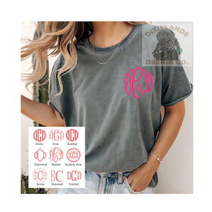 May include: Gray t-shirt with a pink monogram design. The shirt features a crew neck and short sleeves. A selection of monogram styles is displayed below the shirt, including Circle, Vine, and Diamond.