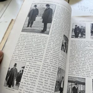 May include: An open book with black and white photographs and text. The images show men in suits and top hats. The text is an article about politics and government.