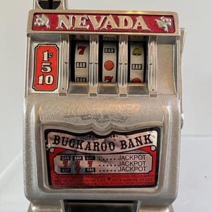 ヴィンテージ BUCKAROO BANK ラスベガス メタル バンク スロット マシン おもちゃ ネバダ グッズ WORKS