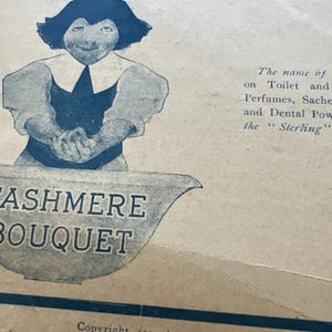 May include: An antique advertisement for "Cashmere Bouquet" with a cartoon-like figure. The text includes details about the product and copyright information, dating back to 1900.