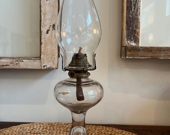 Antique Clear Glass Hurricane Oil Lamp from the late 19th or early 20th century.