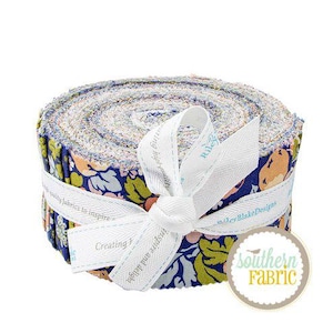 May include: A rolled bundle of patterned fabric in blue, green, and peach hues, tied with a white ribbon. The ribbon features text that reads "Creating fabrics to inspire..." and "Riley Blake Designs". A "Southern Fabric" logo is also visible.