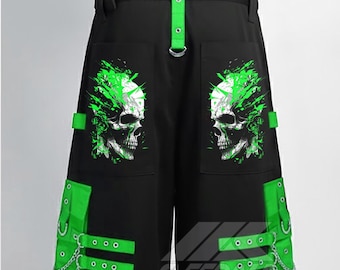 May include: Black pants with green accents and skull graphics. The pants feature green straps, chains, and eyelets. The design includes two skull graphics on the front pockets and a green strap at the waist.
