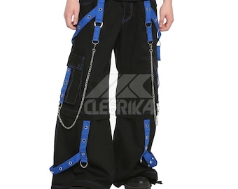 May include: Black cargo pants with blue accents, featuring blue straps, silver chains, and blue stitching. The pants have multiple pockets and the text "CLEERIKA" is visible on the lower right side. The pants have a wide leg design.