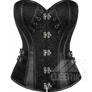 May include: Black corset with a floral pattern and faux leather detailing. The corset has metal clasps and eyelets for fastening and adjustment. The garment has a structured design and is likely made of a sturdy fabric.