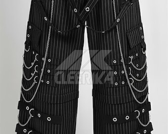 May include: Black and white pinstripe pants with multiple pockets and decorative chains. The pants feature straps, metal rings, and a drawstring waist. The style is reminiscent of alternative fashion.