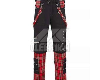 May include: Black pants with red plaid accents on the lower legs and suspenders. The pants have multiple zippers, pockets, and metal hardware. The suspenders are red plaid with black straps and metal clips.