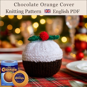 May include: A knitting pattern PDF for a chocolate orange cover featuring text that reads Chocolate Orange Cover Knitting Pattern English PDF. The cover is a brown and white crocheted piece topped with a red berry and green leaves.