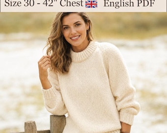 May include: A digital knitting pattern for a jumper, featuring text that reads Ladies Jumper Knitting Pattern Size 30 - 42" Chest English PDF. The image displays a cream-colored, long-sleeved, chunky knit sweater with a ribbed crew neckline.
