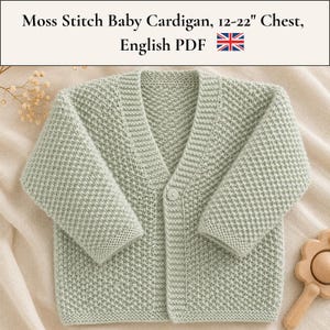 May include: A light sage green knitted baby cardigan featuring a textured moss stitch pattern, a V-neckline, and a single matching button closure. The text at the top reads Moss Stitch Baby Cardigan, 12-22" Chest, English PDF with a UK flag icon.
