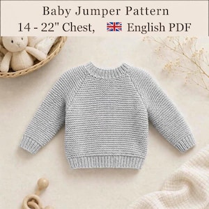 May include: A light grey knitted baby jumper with a round neckline, long sleeves, and ribbed cuffs and hem. The text above reads: Baby Jumper Pattern, 14 - 22" Chest, English PDF. A plush toy and wooden toy parts are visible in the corners.