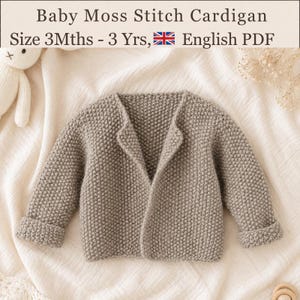 May include: A beige knitted cardigan featuring a moss stitch texture, long sleeves with folded cuffs, and an open front design. The text at the top reads Baby Moss Stitch Cardigan Size 3Mths - 3 Yrs, English PDF, accompanied by a small flag icon.