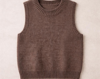 May include: A brown knitted vest with a ribbed crew neck, armholes, and hem. The sleeveless sweater is made of a soft, textured material. This versatile garment can be worn as a layering piece.