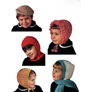 May include: Collection of children's knitted hats and bonnets in various colors. Includes a brown newsboy cap, a pink bonnet with a ruffled edge, a red hood, a yellow bonnet, and a blue and white bonnet with a matching scarf. All are worn by children.