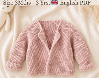 May include: A dusty pink knitted cardigan featuring a textured moss stitch pattern, long sleeves with folded cuffs, and an open front design. The text Baby Moss Stitch Cardigan Size 3Mths - 3 Yrs, English PDF is visible at the top of the image.