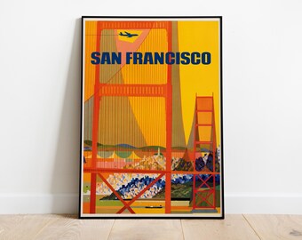 May include: A framed vintage travel poster featuring the Golden Gate Bridge in San Francisco. The poster has a yellow background with the words "SAN FRANCISCO" in blue. An airplane flies above the bridge.