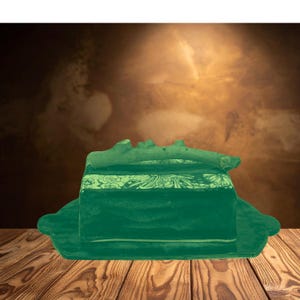 Puede incluir: Un juego de tres tazas de cerámica con un acabado mate moteado. Las tazas son de color crema, gris claro y gris oscuro. Cada taza tiene un diseño simple y minimalista y un asa redondeada.