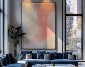 May include: A modern living room with a large abstract painting in shades of pink, peach, and green. A large blue sectional sofa with multiple pillows faces a marble-topped coffee table. A large window offers a view of a city.