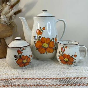 1970s Valencia Sanko | Orange poppy | Coffee pot, creamer and sugar bowl | Stoneware Japan