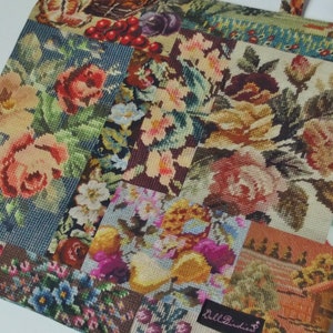 Pode incluir: Uma bolsa tote de patchwork com um design floral. A bolsa &eacute; feita de um tecido grosso e tecido e apresenta uma variedade de flores diferentes em tons de rosa, vermelho, amarelo e azul. A bolsa tem uma al&ccedil;a de couro marrom e um pequeno r&oacute;tulo que diz "Bell Indies".