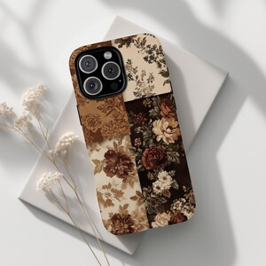 May include: A smartphone case featuring a patchwork design of floral patterns in shades of cream, beige, brown, and dark chocolate. The rectangular case has a cutout for a triple-lens camera system and displays various botanical motifs.