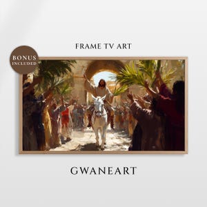 May include: A framed print of a religious scene. The artwork shows a figure on a white donkey, surrounded by people with raised arms and palm branches. The text "FRAME TV ART" and "GWANEART" are visible.