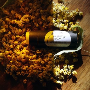 Faerie Balm - organic herbal lip balm and moisturizer in pastel paper push up tube .21 oz or black paper tube .5 oz