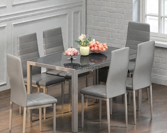 Juego de mesa de comedor moderna de vidrio templado con sillas de cuero sintético para 6 personas