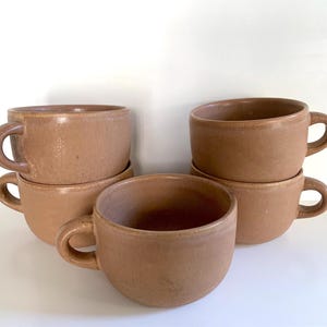 Set of 5  vintage ceramic coffee cups + 4 saucers