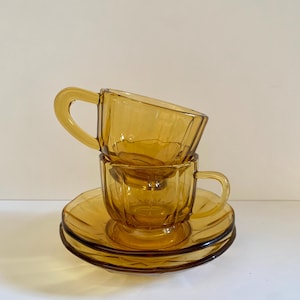 Set of 2 glass vintage coffee cups with saucers