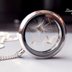 Locket with real dandelions inside