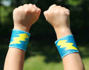 NEW SUPERHERO  WRISTBANDS - Big Lightning Bolt Sparkle Wrist Band sets - As seen on Cool Mom Picks