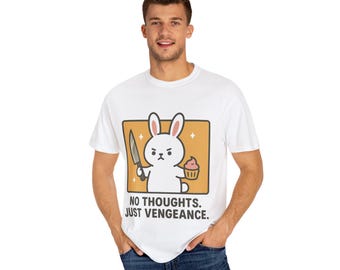 May include: White t-shirt with a cartoon bunny holding a knife and a cupcake. The text "NO THOUGHTS. JUST VENGEANCE." is printed below the bunny.