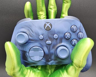 Alien Hand video game controller holder