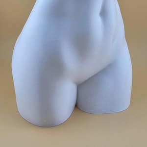 Female body vase
