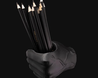 Fist pencil holder