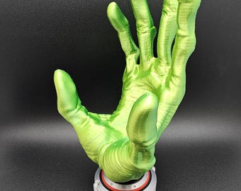 Alien Hand video game controller holder