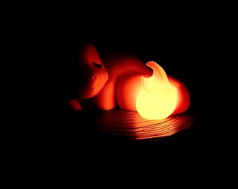 Sleeping Charmander on a stump night light