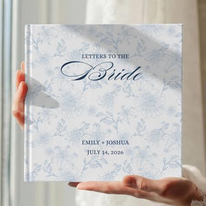 May include: A handmade wooden sign, painted white with black lettering, reading "Welcome to our home". The sign has a distressed finish, suitable for indoor or outdoor use. The text is in a handwritten style.