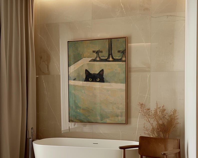 May include: A framed painting shows a black cat in a bathtub, with a green and white color palette. The artwork is set in a bathroom, with a white bathtub and neutral-toned walls. The painting has a gold frame, adding to its aesthetic appeal.